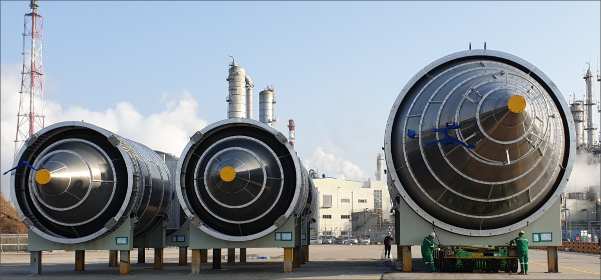 Silos before installation at a polymer plant